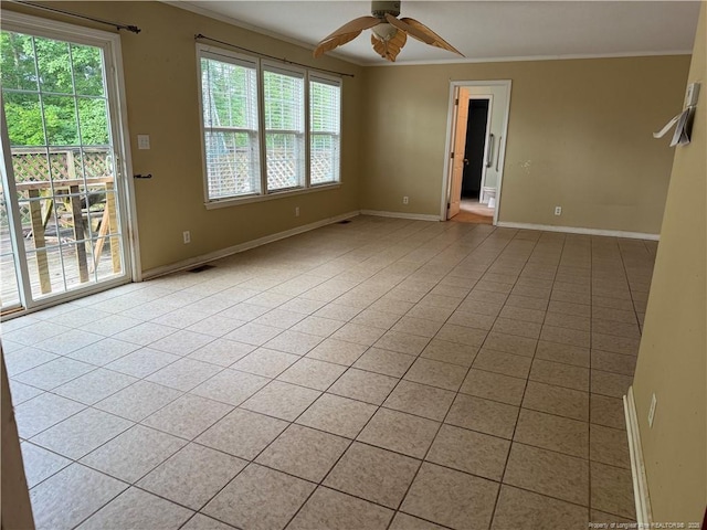 921 Pickard Rd, Sanford, NC 27330 - unfurnished room featuring crown molding, ceiling fan, baseboards, and light tile patterned floors