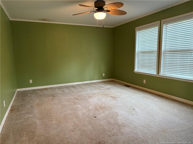 921 Pickard Rd, Sanford, NC 27330 - unfurnished room with crown molding, a ceiling fan, carpet, and baseboards