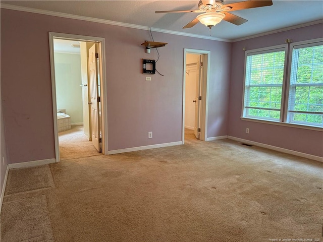921 Pickard Rd, Sanford, NC 27330 - spare room featuring ceiling fan, ornamental molding, light carpet, and baseboards