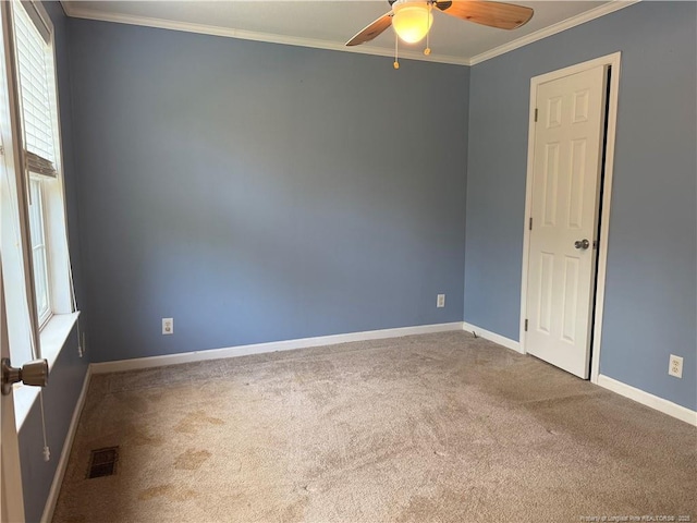 921 Pickard Rd, Sanford, NC 27330 - carpeted empty room featuring a ceiling fan, plenty of natural light, ornamental molding, and baseboards