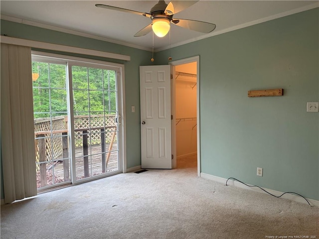 921 Pickard Rd, Sanford, NC 27330 - carpeted empty room with a ceiling fan, baseboards, and crown molding