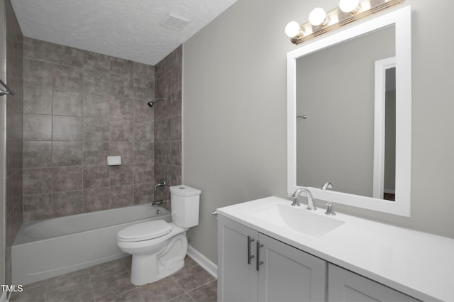 full bath with vanity, toilet, tile patterned floors, baseboards, and shower / bathing tub combination