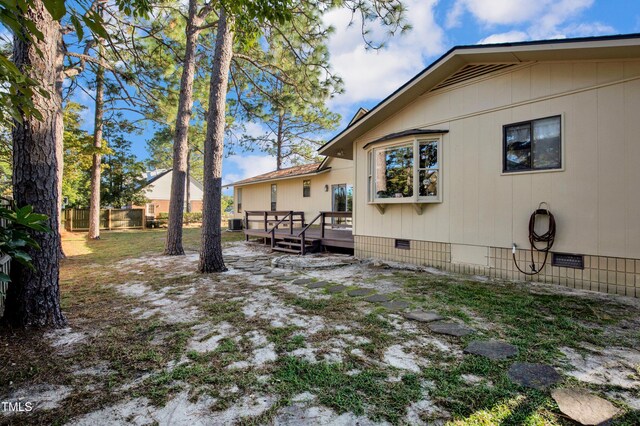 view of yard featuring a deck