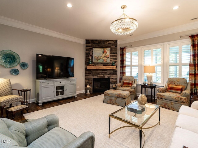 living area featuring crown molding, baseboards, a chandelier, a stone fireplace, and dark wood-style floors
