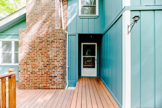 doorway to property with board and batten siding