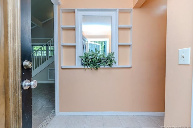 interior space with baseboards