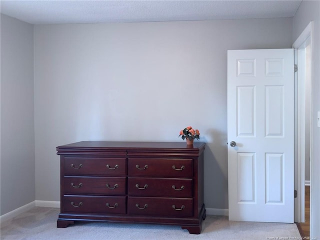 6739 Irongate Dr Unit B, Fayetteville, NC 28306 - bedroom with baseboards and light colored carpet