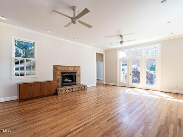 1605 Park Dr, Raleigh, NC 27605 - unfurnished living room featuring baseboards, light wood-style floors, and ceiling fan