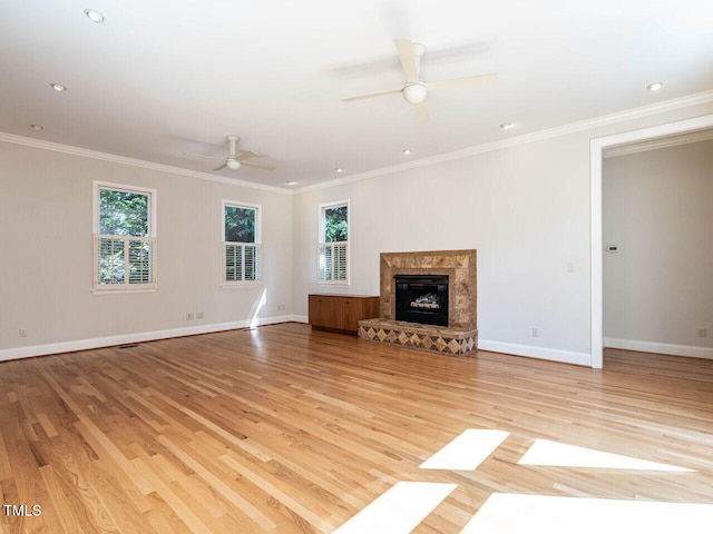 1605 Park Dr, Raleigh, NC 27605 - unfurnished living room featuring plenty of natural light, light wood finished floors, and ceiling fan