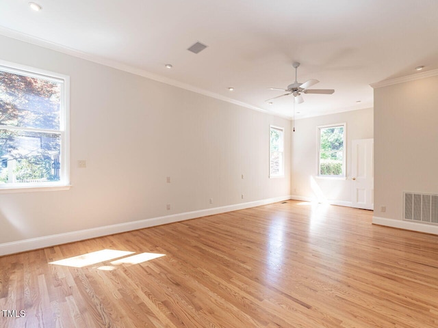 1605 Park Dr, Raleigh, NC 27605 - unfurnished room with visible vents, baseboards, and light wood finished floors