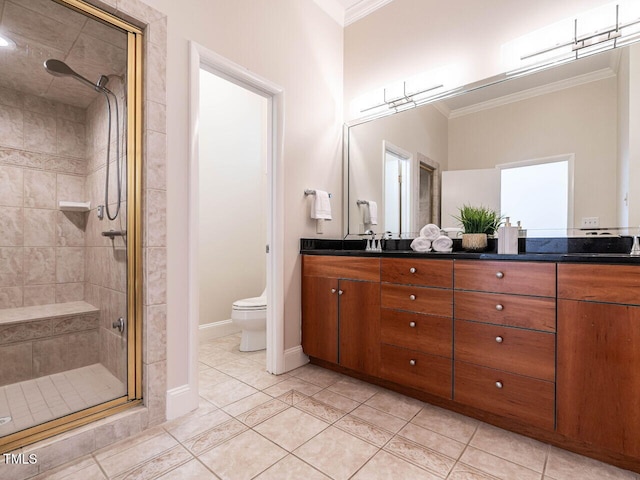 1605 Park Dr, Raleigh, NC 27605 - bathroom featuring double vanity, crown molding, a stall shower, baseboards, and toilet