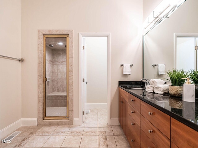 1605 Park Dr, Raleigh, NC 27605 - bathroom with vanity, baseboards, a stall shower, and visible vents
