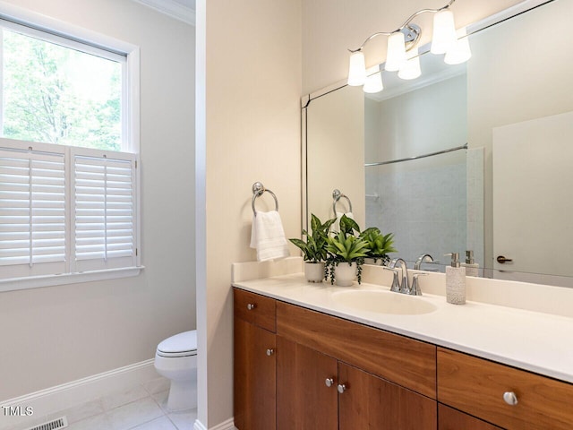 1605 Park Dr, Raleigh, NC 27605 - bathroom featuring tile patterned flooring, baseboards, vanity, toilet, and ornamental molding