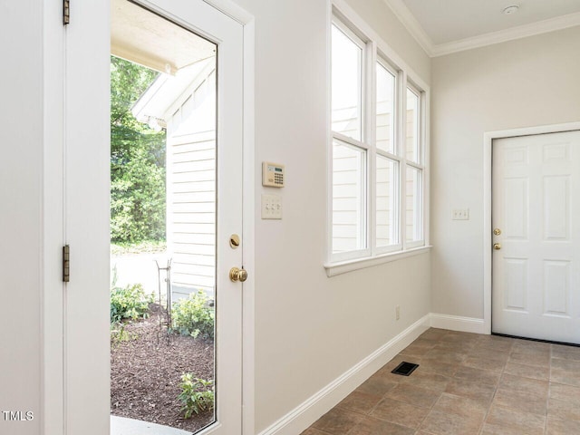 1605 Park Dr, Raleigh, NC 27605 - entryway featuring baseboards, crown molding, and visible vents