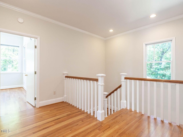 1605 Park Dr, Raleigh, NC 27605 - stairs featuring recessed lighting, ornamental molding, plenty of natural light, and wood finished floors