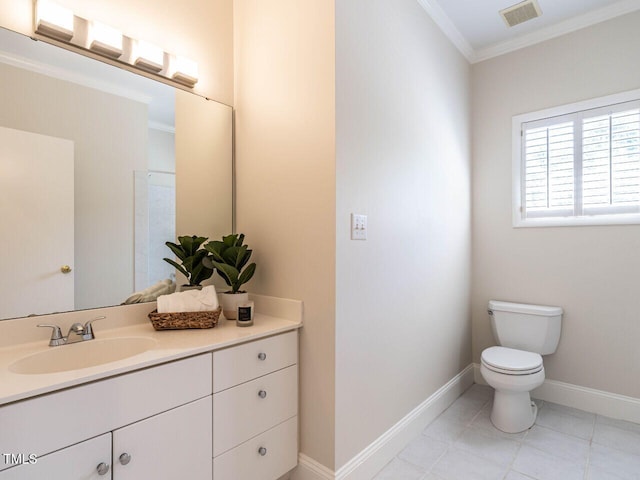 1605 Park Dr, Raleigh, NC 27605 - bathroom with visible vents, crown molding, vanity, baseboards, and toilet