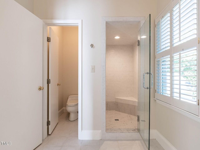 1605 Park Dr, Raleigh, NC 27605 - bathroom with baseboards, tile patterned floors, a stall shower, and toilet