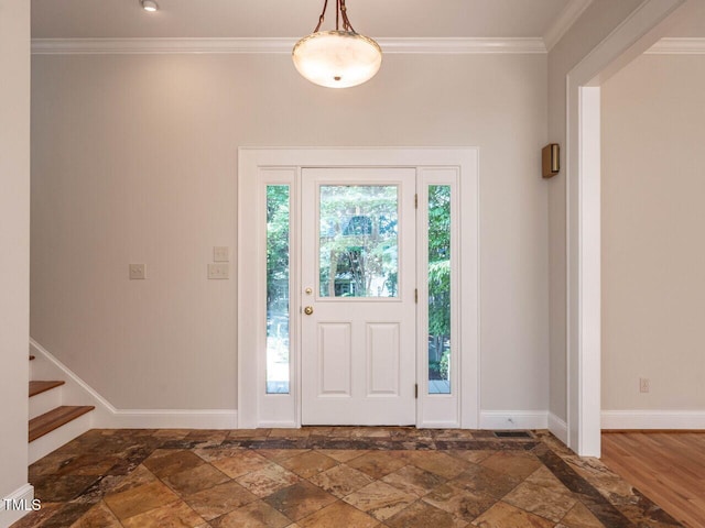 1605 Park Dr, Raleigh, NC 27605 - entrance foyer with crown molding, visible vents, baseboards, stone finish floor, and stairway