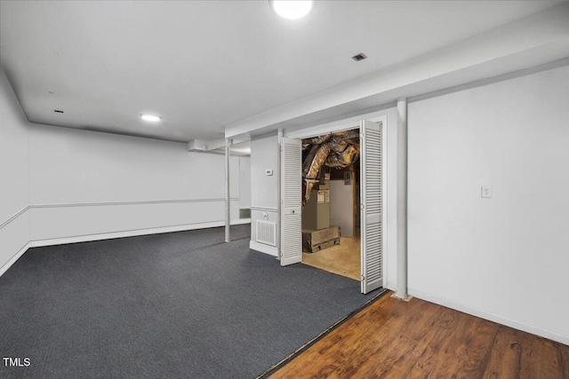 finished basement featuring recessed lighting and baseboards