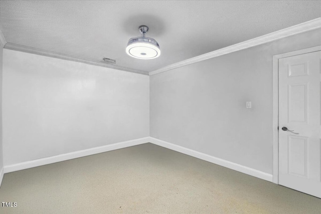 carpeted empty room with a textured ceiling, baseboards, and ornamental molding