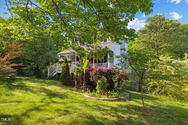 view of yard with a porch