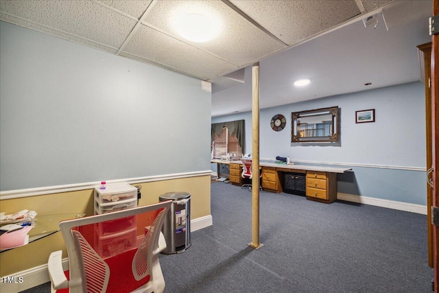 finished below grade area featuring recessed lighting, baseboards, and dark colored carpet