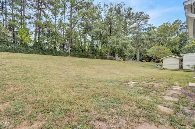 view of yard featuring fence