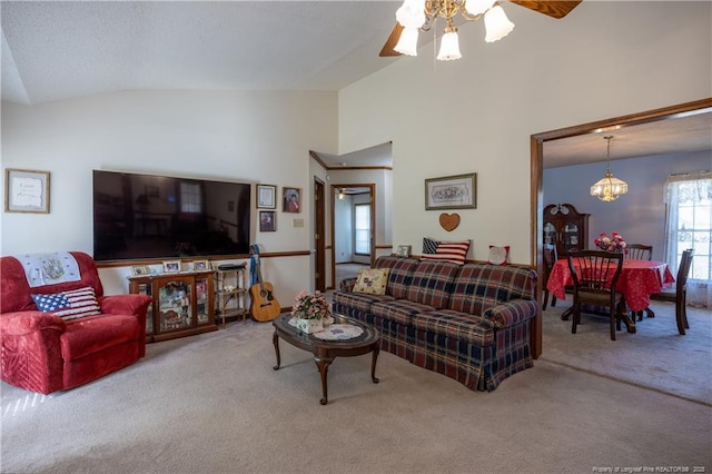 390 Sandy Ridge Rd, Dunn, NC 28334 - living area featuring carpet, ceiling fan with notable chandelier, and lofted ceiling