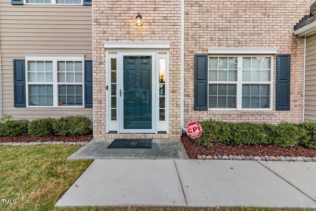 2902 Framer Ln, Durham, NC 27704 - property entrance featuring brick siding
