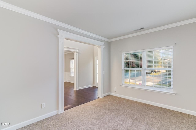 2902 Framer Ln, Durham, NC 27704 - spare room with carpet, ornamental molding, decorative columns, plenty of natural light, and baseboards