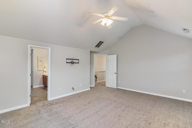 2902 Framer Ln, Durham, NC 27704 - unfurnished bedroom with carpet, lofted ceiling, baseboards, and ensuite bath