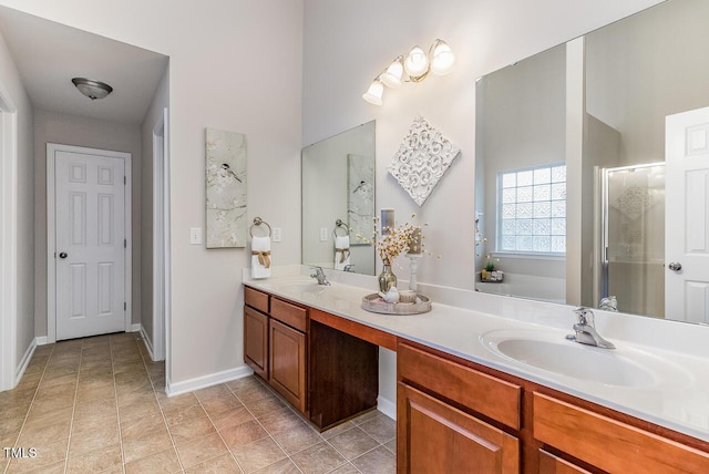 2902 Framer Ln, Durham, NC 27704 - full bath featuring double vanity, a shower stall, tile patterned flooring, and baseboards