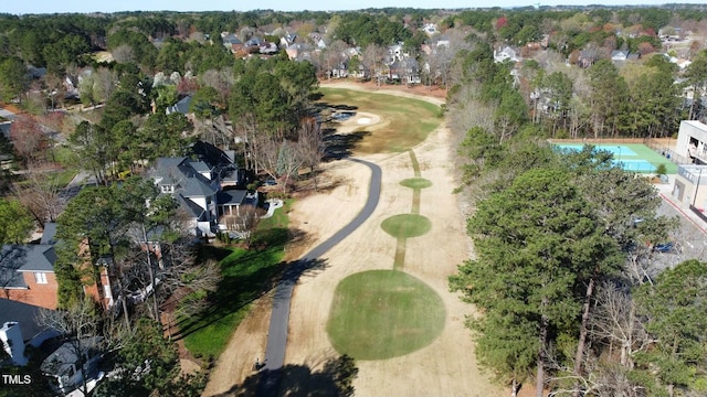 drone / aerial view featuring a residential view and golf course view