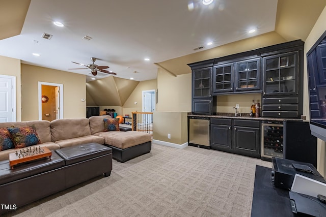 living area featuring wet bar, visible vents, light carpet, and wine cooler