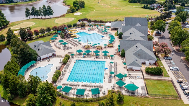 aerial view with a water view and golf course view