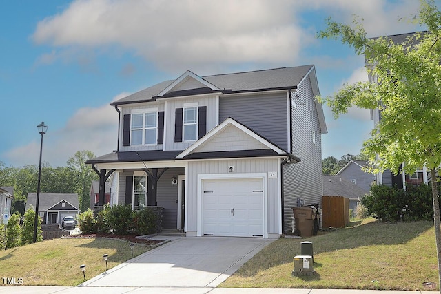 view of front of home featuring covered porch, board and batten siding, concrete driveway, and a front lawn
