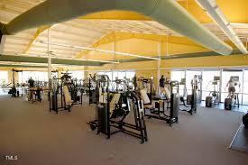 workout area featuring vaulted ceiling