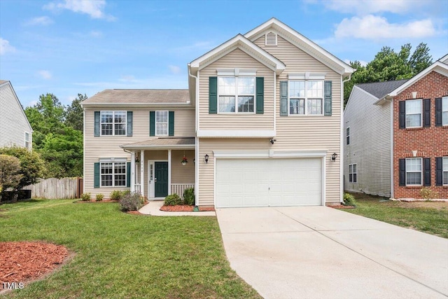 8408 Haines Creek Ln, Raleigh, NC 27616 - traditional-style home with fence, an attached garage, driveway, and a front yard
