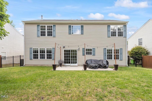 8408 Haines Creek Ln, Raleigh, NC 27616 - rear view of property with a patio, a fenced backyard, and a yard