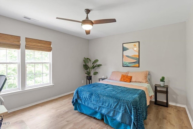 8408 Haines Creek Ln, Raleigh, NC 27616 - bedroom featuring ceiling fan, baseboards, visible vents, and wood finished floors