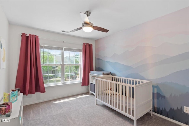 8408 Haines Creek Ln, Raleigh, NC 27616 - carpeted bedroom featuring baseboards, ceiling fan, a crib, and visible vents