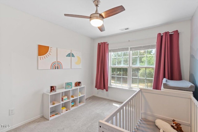 8408 Haines Creek Ln, Raleigh, NC 27616 - bedroom with ceiling fan, visible vents, a nursery area, baseboards, and carpet