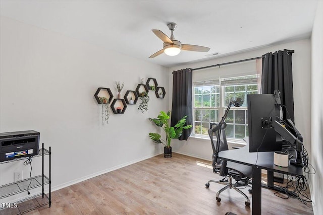 8408 Haines Creek Ln, Raleigh, NC 27616 - office area featuring baseboards, ceiling fan, and wood finished floors