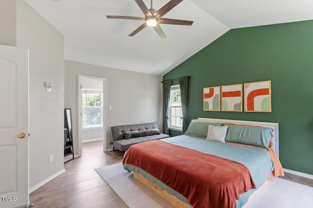 8408 Haines Creek Ln, Raleigh, NC 27616 - bedroom with baseboards, vaulted ceiling, and multiple windows