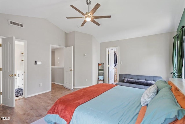 8408 Haines Creek Ln, Raleigh, NC 27616 - bedroom with baseboards, wood finished floors, a spacious closet, lofted ceiling, and visible vents