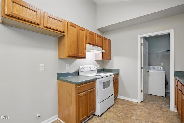 5414 Stanley Rd, Durham, NC 27704 - kitchen with dark countertops, white range with electric cooktop, baseboards, washer / dryer, and under cabinet range hood