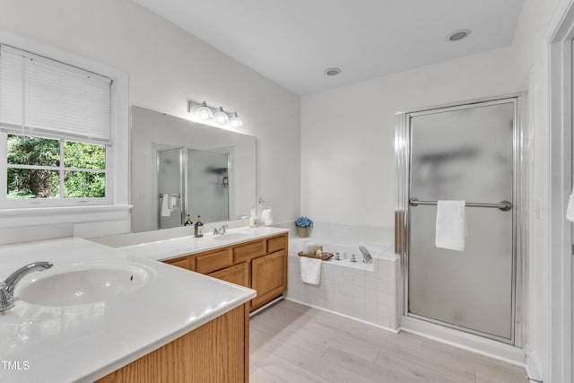 111 Ferncroft Ct, Cary, NC 27519 - bathroom featuring vanity, a bath, and a shower stall