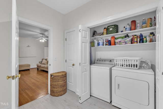 111 Ferncroft Ct, Cary, NC 27519 - laundry area with washing machine and clothes dryer, ceiling fan, and light wood-type flooring