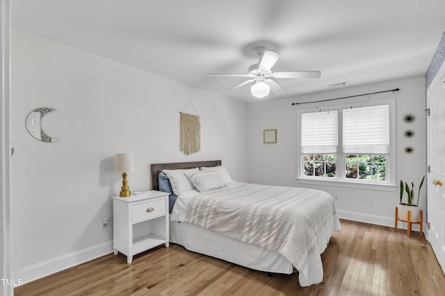 111 Ferncroft Ct, Cary, NC 27519 - bedroom featuring baseboards, light wood-style flooring, and ceiling fan