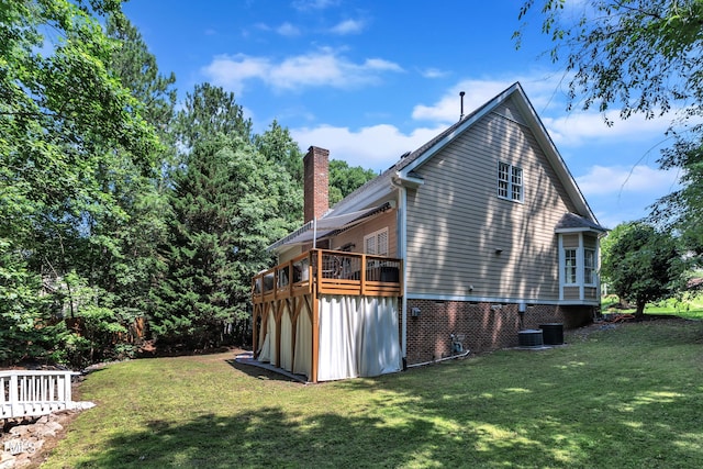 111 Ferncroft Ct, Cary, NC 27519 - view of side of property with a lawn, a chimney, and central AC